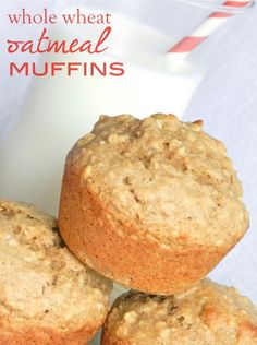 three muffins stacked on top of each other next to a glass of milk