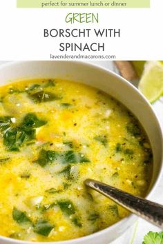 a white bowl filled with broccoli and spinach soup on top of a table