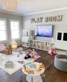 a child's play room with toys and decor