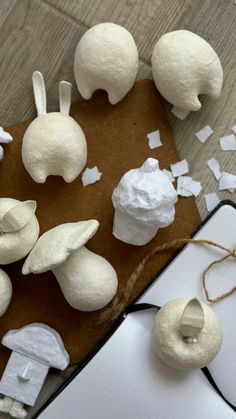 the paper mache is being made to look like mushrooms