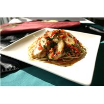 a white plate topped with food on top of a table