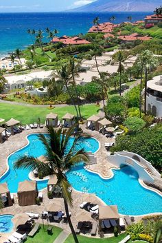 an aerial view of the pool and beach area at four seasons resort, kaua'i