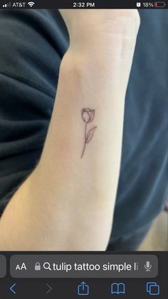 a small flower tattoo on the wrist is shown in an instagramtion screen shot