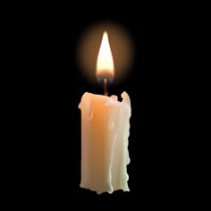 a lit candle is shown against a black background