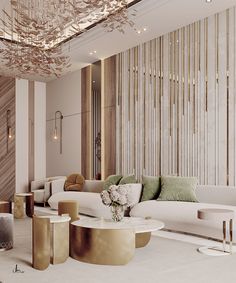 an elegant living room with white couches and gold accents on the walls, chandelier hanging from the ceiling