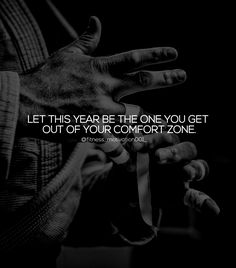 someone holding their hands together with the quote let this year be the one you get out of your comfort zone