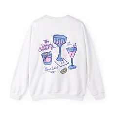 Matching bachelorette sweatshirts in a cocktail bar theme. Check the listing photos for sweatshirt and ink colors. Customize front graphic (martini) to anything you see on the back! To order 👉🏼 Add your sizes separately to cart, and then click on your cart to adjust quantities if needed. Let us know your personalizations and we will take it from there! You'll receive a mock-up of your design to approve prior to production. View more merch  👉🏼 etsy.me/3RcSCCS ✨Product Details ✨ .: 50% cotton, Bachelorette Sweatshirts, Custom Bachelorette, Bachelorette Favors, Party Bachelorette, Bachelorette Weekend, Cocktail Bar, Apparel Fabric, Ink Color, Mockup Design