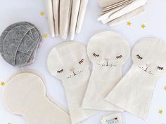 the supplies needed to make these diy cat mitts are laid out on a white surface