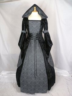 This is for a custom made dress,it will be made to the measurements you send me.Please send me your bust,waist and hip measurement,and please measure from the top of your shoulder to the floor with shoes on.It will be made with beautiful black crushed velvet and stunning grey and black jacquard.It will have a corset style front and back with black lacing so you can adjust the dress to fit your body shape.Combined shipping on multiple items.If you purchase express shipping by courier please send Wedding Dress Gothic, Medieval Wedding Dress, Gothic Gowns, Custom Made Dress, Dark Green Dress, Made Dress, Medieval Dress, Hooded Dress, Gothic Dress