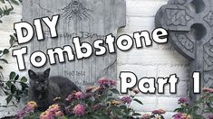 a black cat sitting on top of flowers in front of a stone wall with the words diy tombstonetone part 1