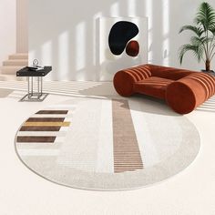 a modern living room with an orange chair and rug