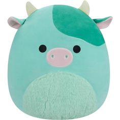 a green stuffed animal with horns on it's head and nose, sitting in front of a white background