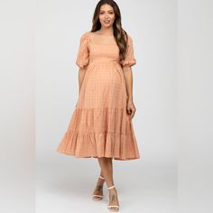 A Solid Plaid Print Midi Dress Featuring A Square Neckline, Short Puff Sleeves, An Empire Waist And A Ruffle Hem. Lovely Day By Pinkblush New Without Tags Inventory #P9247 Spring Maternity Midi Dress Knee-length, Chic Peach Midi Dress With Ruffles, Spring Maternity Dresses, Knee-length, Feminine Peach Midi Dress With Ruffles, Chic Peach Ruffled Midi Dress, Spring Maternity Knee-length Dresses, Chic Midi Maternity Dress For Brunch, Spring Casual Tiered Maternity Dress, Spring Fitted Maternity Dress Midi Length