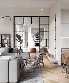 an image of a living room and dining area in the same house, which is on instagram