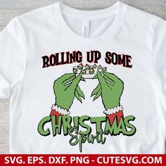 a white shirt with the words rolling up some christmas spirit