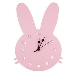 a pink clock with the shape of a rabbit's head