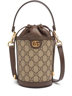 Height: 20cm Width: 11.5cm Depth: 8cm. Weight: approx. 0.3kg. Strap drop: 53.5cm. Top handle drop: 10cm. Adjustable detachable strap. Single top handle. Drawstring closure. Logo details. All over pattern placement may vary. Gold-colored metal hardware. Leather trim Gucci Bucket Bag, Canvas Bucket Bag, Gucci Mini, Gucci Ophidia, All Over Pattern, Browning Logo, Metal Hardware, Leather Trim, Leather Trims