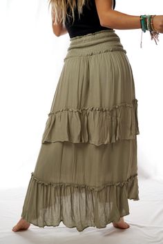 Feeling like we washed ashore in the most amazing skirt ever! Our Washed Ashore Maxi Skirt features a wide smocked elastic waistband and asymmetrical hem with ruffle tiers. Wear as a skirt or pull up to wear as a dress, the versatility of this piece makes it a closet essential. Its effortless boho vibes make it a daily staple! *Due to lighting and differences in monitors, actual colors may vary slightly from what appears online. Model is 5'4" and wearing a size Small. Approximate measurements ar Breezy Tiered Maxi Skirt, Breezy Ruffled Maxi Skirt, Breezy Tiered Maxi Skirt With Ruffles, Breezy Ruffled Tiered Maxi Skirt, Breezy Tiered Ruffle Maxi Skirt, Flowy Breezy Maxi Skirt With Ruffles, Breezy Flowy Maxi Skirt With Ruffled Detail, Breezy Flowy Maxi Skirt With Ruffles, Breezy Tiered Maxi Skirt For Summer