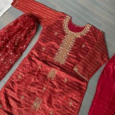 3pc Suit Size :44 Kamij Pit To Pit:22” Waist:20” Bust:23” Sleeve:18” Length:45” Pants Length:40” Fabric: Organza , Cotton Blend Jori , Stone And Embroidery Work All Over The Dress . Brand New Never Been Used Red Silk Churidar For Transitional Season, Transitional Red Silk Churidar, Transitional Season Red Raw Silk Sets, Transitional Red Sharara With Dabka Details, Festive Red Silk Churidar, Transitional Red Raw Silk Sets, Red Chinon Salwar Kameez For Transitional Season, Red Silk Salwar Kameez With Dabka Work, Semi-stitched Silk Sets With Dabka Detailing