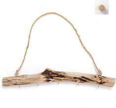 a piece of wood hanging from a rope