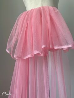 a pink tulle skirt on a mannequin