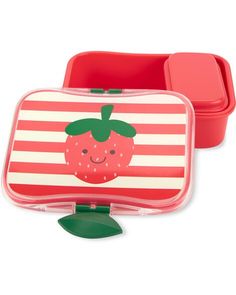 two red and white lunchboxs with strawberries on the front, one has a green leaf