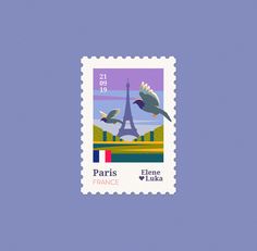 a stamp with two birds flying over the eiffel tower in paris, france