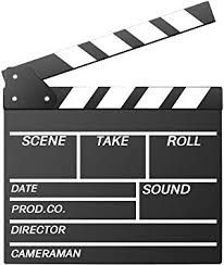 a movie clapper with the words'scene take roll'written in white on it