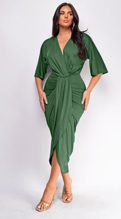 Midi length dress Front drape detail V neckline 90% Polyester, 10% Spandex (Stretchy) Model's height: 5'6" Model is wearing size S