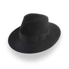 Stand Out with a Beaver Felt Fedora Experience the luxury of a beaver felt fedora with a custom fit. Crafted from premium beaver fur felt, this fedora features a distinctive teardrop crown and a sleek grosgrain ribbon hatband. Its smooth finish and precise tailoring ensure comfort and style, making it a perfect addition to any wardrobe. Customizable in any color and size, it’s delivered in a protective hat box with care instructions. This hat promises a lifetime of elegance and sophistication, enhancing your unique style with every wear. Hat Ads, Outdoor Hut, America Latina, Felt Fedora, Formal Casual, Custom Monogram