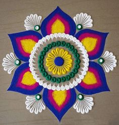 a colorful flower design made out of yarn