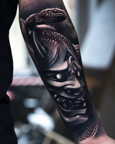 a person with a tattoo on their arm