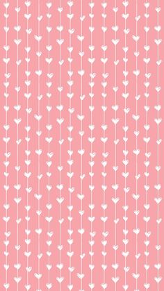 a pink background with white flowers on it