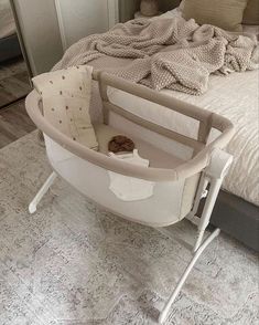 a baby's crib in the middle of a bedroom