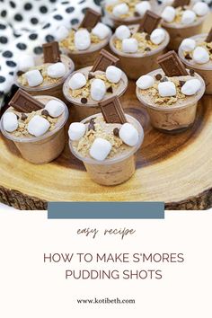 desserts with marshmallows and chocolate are on a wooden platter that says easy recipe how to make s'mores pudding shots