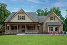 a house that is sitting in the grass