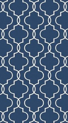 a blue and white wallpaper with an intricate design