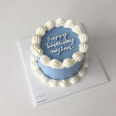 a blue and white birthday cake with the words happy birthday my love written on it