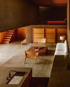 a living room filled with lots of furniture