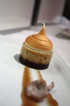 a small dessert sitting on top of a white plate