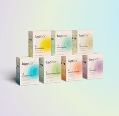 six boxes of luplor on a pastel background