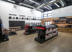 the inside of a car repair shop with many items on display