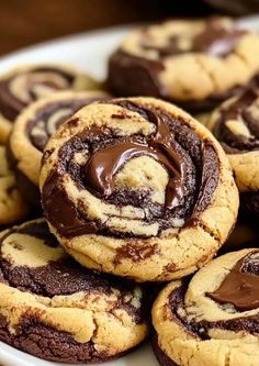 chocolate swirl cookies on a white plate