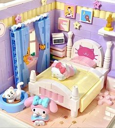 a doll house bedroom with furniture and accessories