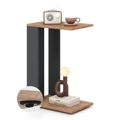 a wooden shelf with two books, a camera and a coffee cup on top of it