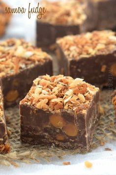 some brownies with nuts on top of them