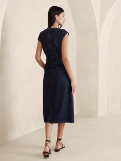 We reimagined the classic shift dress in a versatile, lightweight denim fabric we sourced from Italy.  Here, we added subtle cap sleeves and darts to shape the waist for an almost corset-like silhouette.  Fit and flare.  In-Conversion Cotton: Banana Republic is committed to sourcing organic cotton, as well as in-conversion cotton to support growers as they transition to certified organic farming methods, a process that can take up to 36 months.  Crew neck.  Invisible zip at back.  Side seam pock Party Sale, Denim Midi Dress, Indigo Colour, Invisible Zip, Organic Farming, Denim Fabric, Midi Length, Fit And Flare, Shift Dress