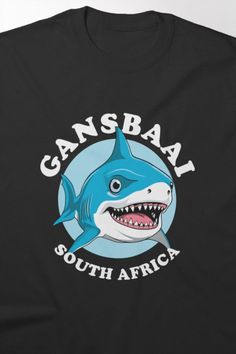 a black t - shirt with an image of a shark and the words gansbal south africa