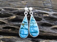 Turquoise Earrings, Native American Navajo Kingman Turquoise Sterling Silver Post Teardrop Earrings Signed Shop Here: https://etsy.me/2XeXQRh These beautiful, post, dangle, teardrop shaped earrings with the turquoise stones slightly raised are simply stunning.  The intense blue color with brown matrix is perfect for wearing with casual or dressy outfits.  There is a simple elegance about these earrings.  They are light weight and make a very memorable gift that will last a lifetime. Post Drop Ea Earrings Native American, Turquoise Stones, Kingman Turquoise, Dressy Outfits, Fringe Earrings, Photo Bracelet, Simple Elegance, Turquoise Earrings, Memorable Gifts