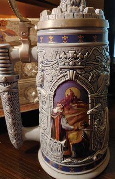 a close up of a beer mug on a table